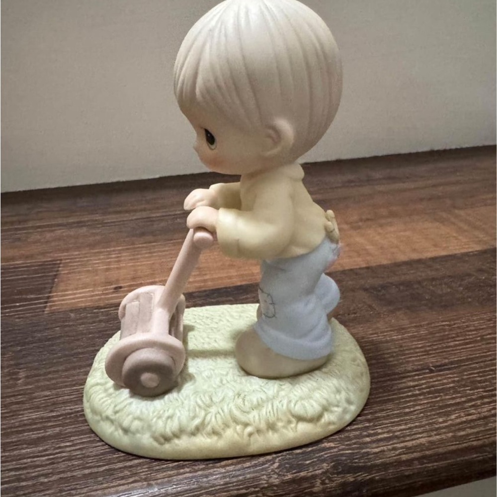 1989 Members Only figurine “Mow power to ya!”